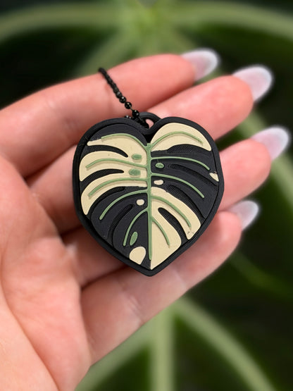 Fidget Leaf Clicker Variegated Monstera mit grün-weißem Muster inspiriert von panaschierten Pflanzen